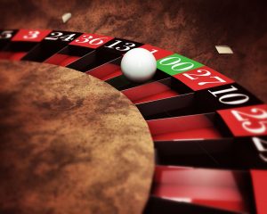 15884136 - casino roulette with white ball on green numbers